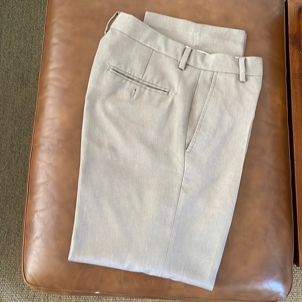 Tan color pair of pants flat front